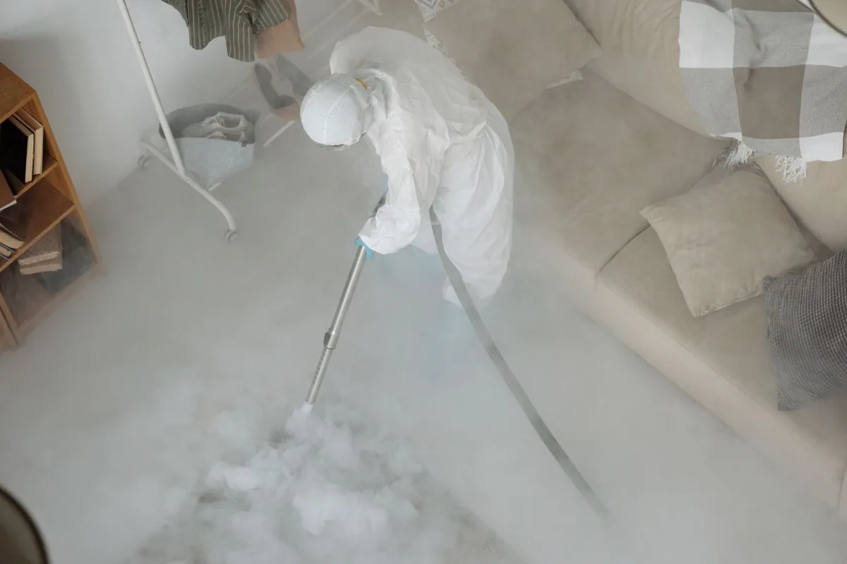 Biohazard cleanup technician in protective equipment, Wellington, FL